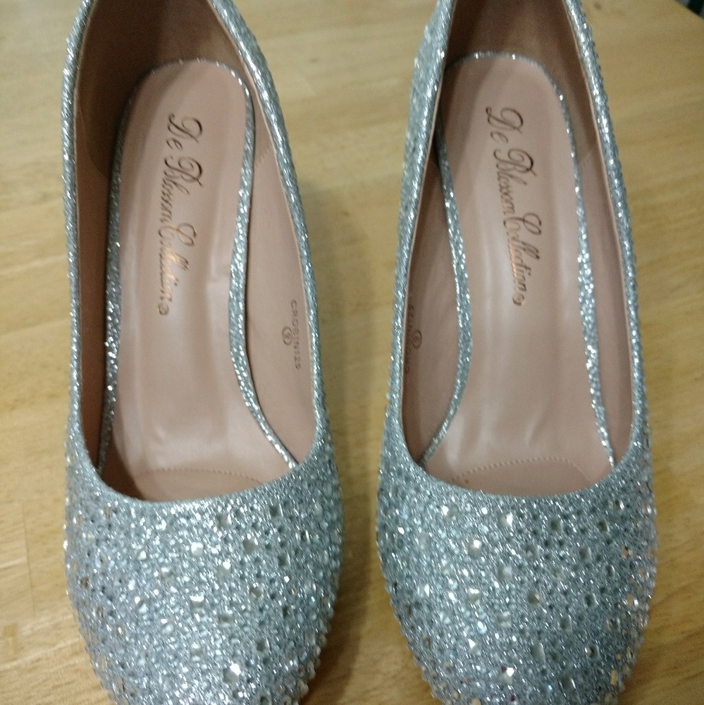 Beautiful rhinestone heels. Size 9, fits like 9.5